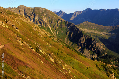 Poland, Tatra Mountains, Zakopane - track to Swinica peak, Przelecz pod Swinica Pass, Liliowe peak with High Tatra mountain range panorama in background