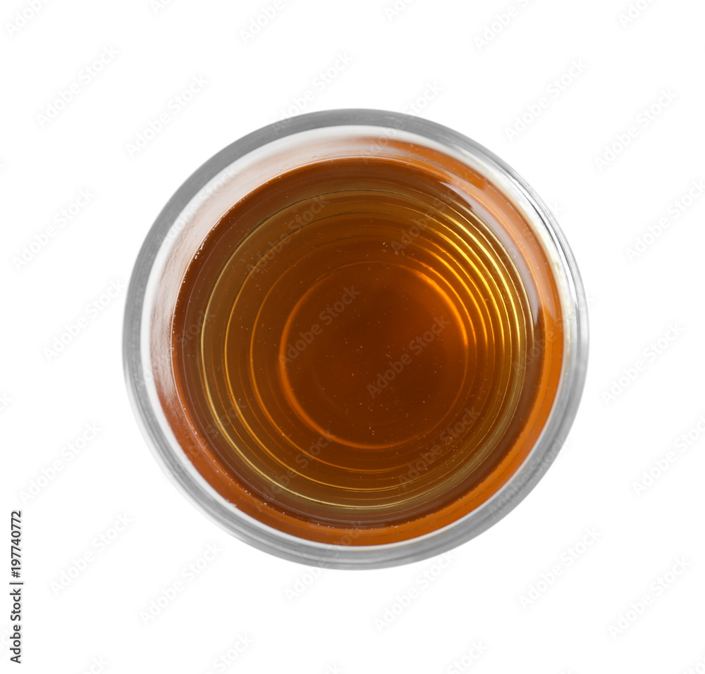 Glass of fresh apple juice on white background, top view Glass of fresh apple juice on white background, top view
