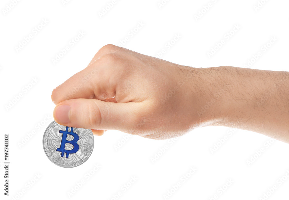 Man holding silver bitcoin on white background Man holding silver bitcoin on white background