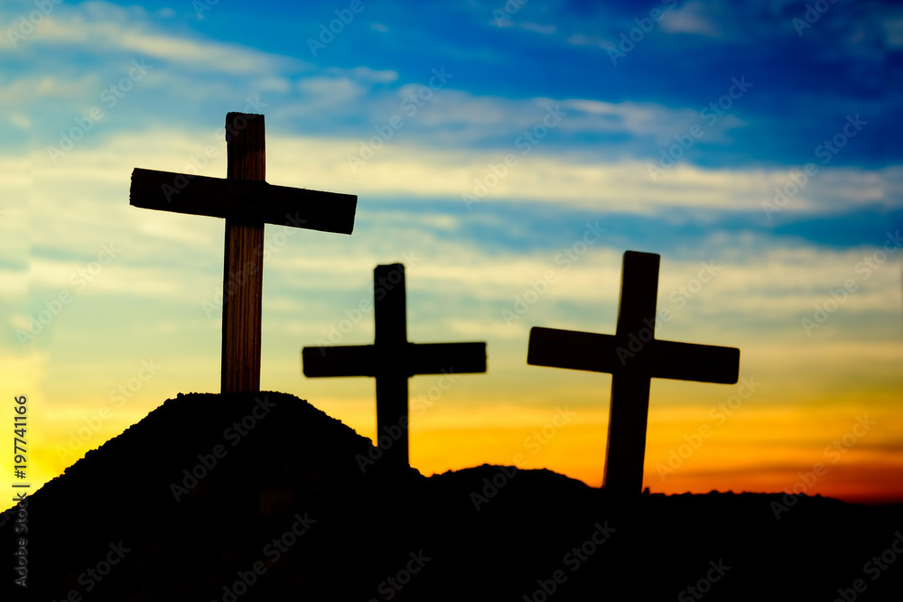 Crucifixion Of Jesus Christ At Sunrise - Silhouette Three Crosses On Hill Crucifixion Of Jesus Christ At Sunrise - Silhouette Three Crosses On Hill