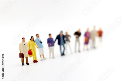 Miniature people: Business Person Candidate People Group. Employer of choice, candidate selection, adn business recruitment concept.