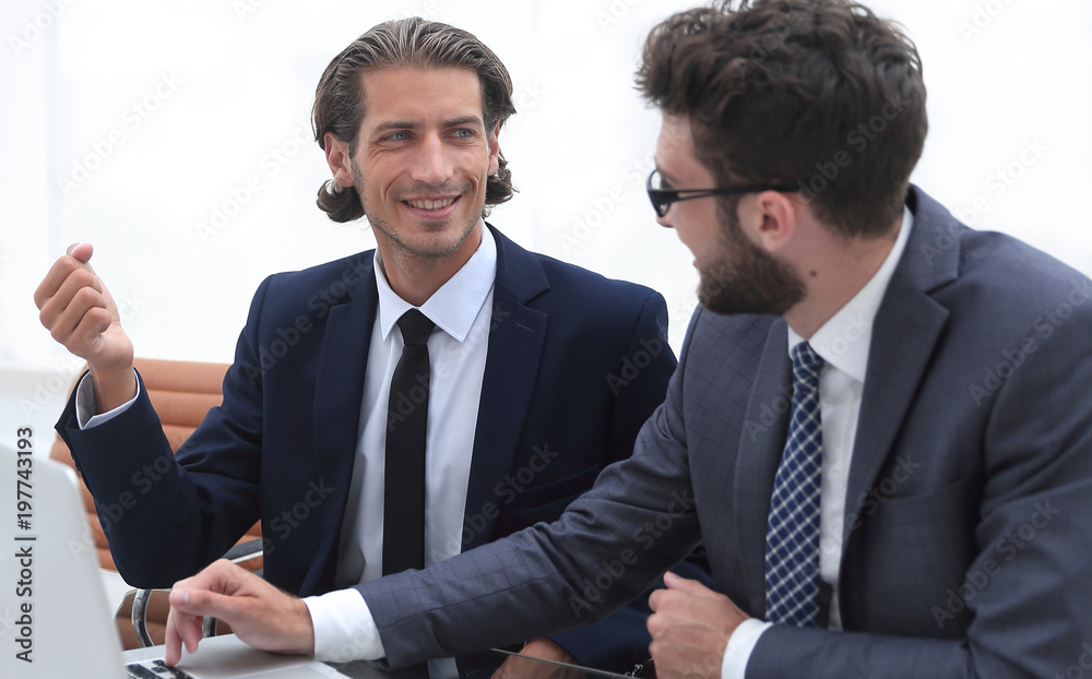 Fototapeta premium two business people working on laptop.
