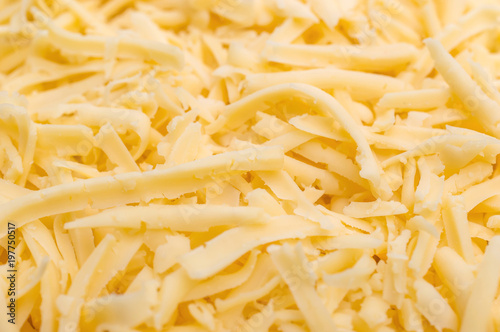 Grated cheese as food background. Close up.