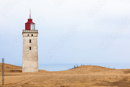 Lighthouse at Råbjerg mile in Denmark in the sand dunes © Lars Johansson