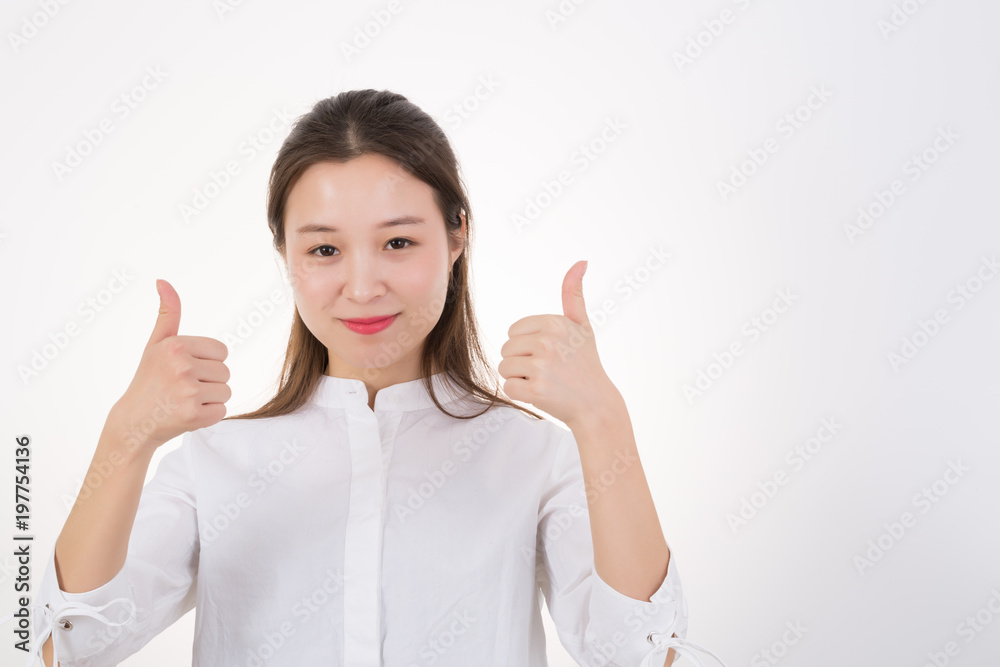 Happy young beautiful woman doing thumbs up. Happy young beautiful woman doing thumbs up.