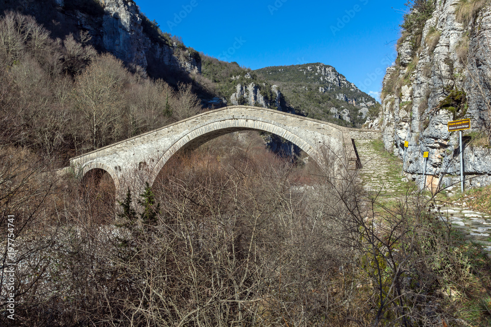 Amazing landscape of Bridge of Missios in Vikos gorge and Pindus Mountains, Zagori, Epirus, Greece Amazing landscape of Bridge of Missios in Vikos gorge and Pindus Mountains, Zagori, Epirus, Greece