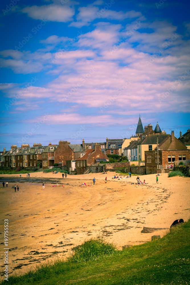 North Berwick beach and tourists walking on the sand, East Lothian North Berwick beach and tourists walking on the sand, East Lothian