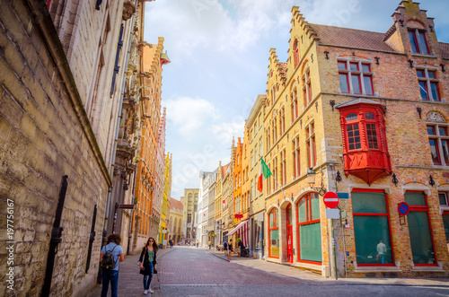 Beautiful narrow streets and traditional houses in the old town of Bruges (Brugge), Belgium © Olena Zn