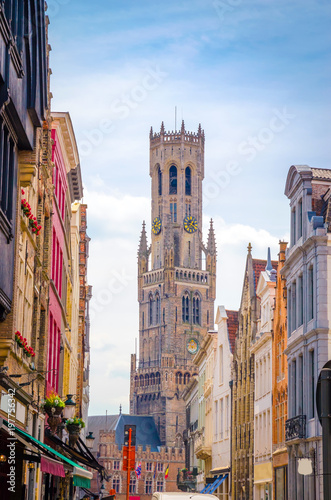 The Belfry Tower (aka Belfort) and traditional narrow streets in Bruges (Brugge), Belgium