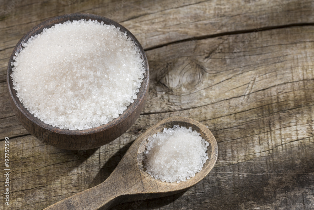 White refined sugar in the bowl White refined sugar in the bowl