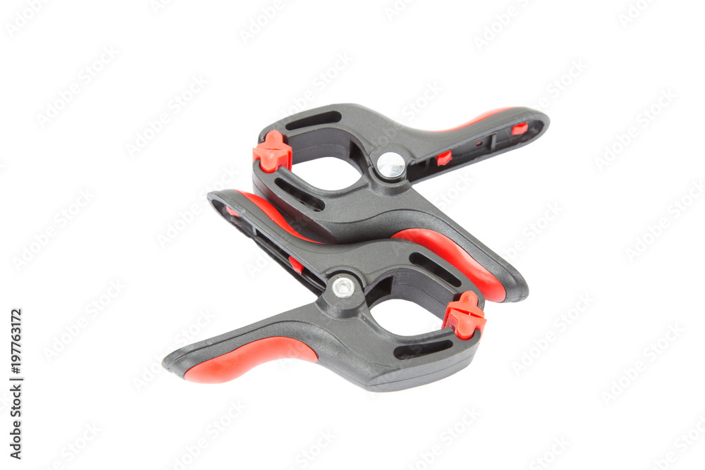 Obraz premium Plastic spring clamp on white background, Isolated.