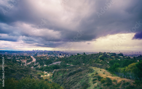 Stunning Panoramic aerial view of Los Angeles in a rainy stormy weather overlooking Downtown  Hollywood and other areas.