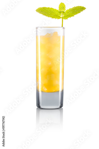 Yellow shot cocktail with mint and ice cubes isolated on white background. Clipping path