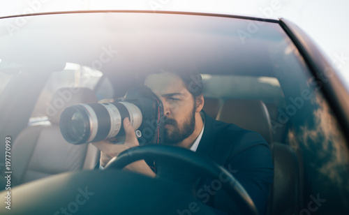 Fotografie Private detective investigating secret case.