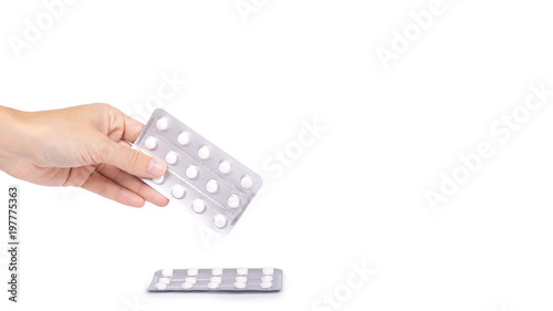 Medicine in tablet package in hand isolated on white background, pills in blister. copy space, template