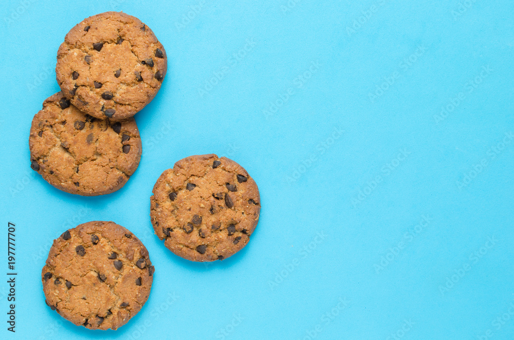 Cookies with chocolate on a blue background. Cookies with chocolate on a blue background.