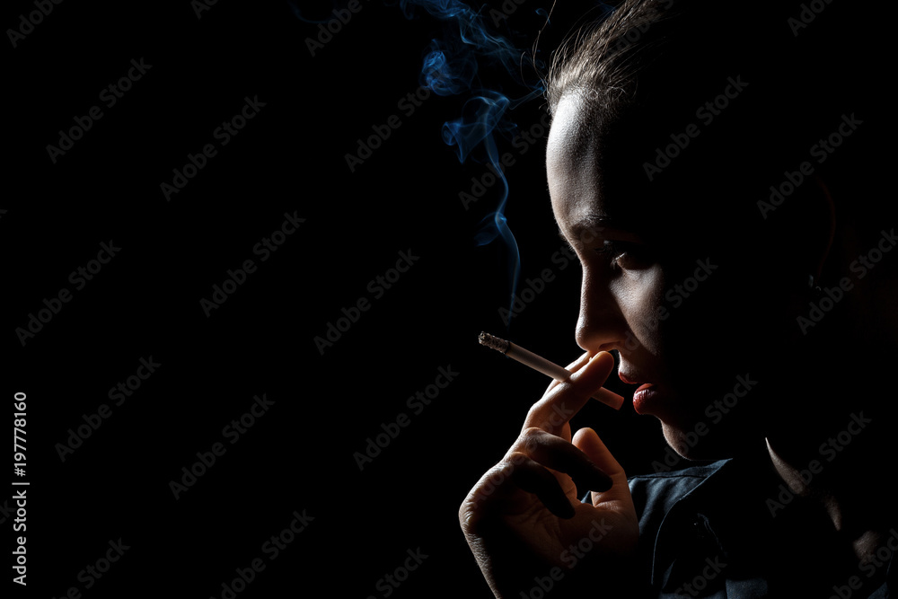 Fototapeta premium woman smoking cigarette