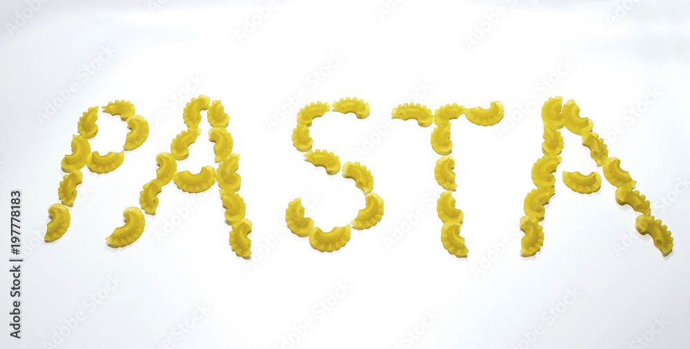 A word of pasta made from macaroni pasta on a white background. Healthy diet and lifestyle. A word of pasta made from macaroni pasta on a white background. Healthy diet and lifestyle.