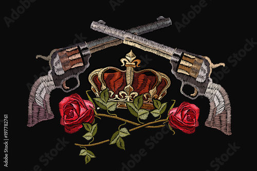 Embroidery crown, crossed guns and roses. Template for clothes, textiles, t-shirt design. Classical embroidery revolvers, golden crown and spring roses. Symbol of romanticism and crime