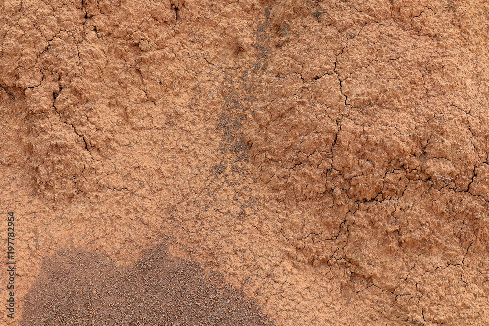 soil brown red background texture (selective focus)