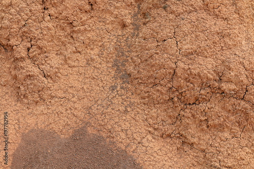 soil brown red background texture (selective focus)