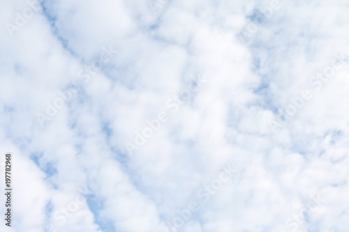 sky is thick with fluffy clouds white background  fluffy clouds soft dense on sky