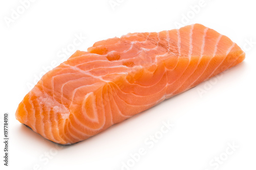 Fotografija Fresh salmon fillet with basil on the white background.