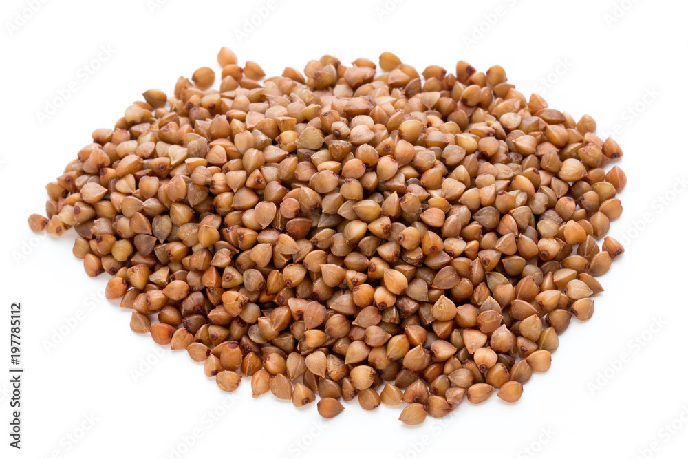 Buckwheat grains isolated on the white background. Buckwheat grains isolated on the white background.