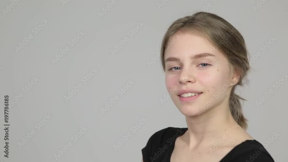 Girl shows different facial expressions and emotions