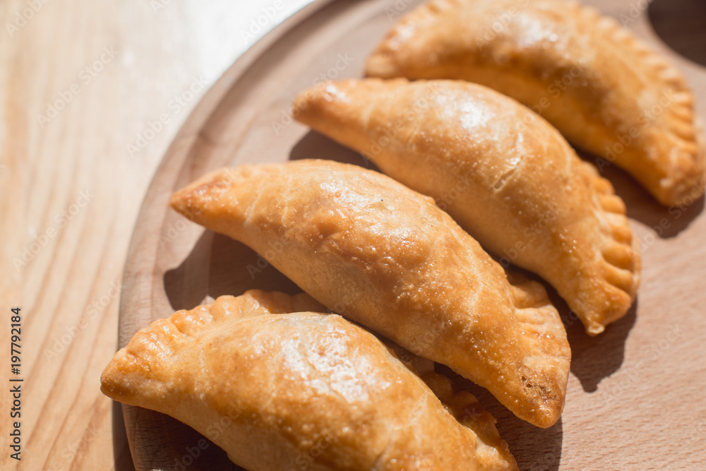 A delicious empanadas with chicken meat, typical dish of Argentinean cuisine