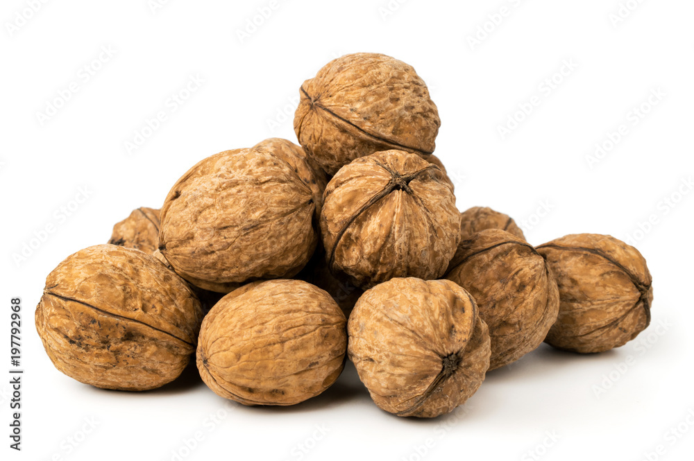 A bunch of walnuts on a white, isolated. A bunch of walnuts on a white, isolated.