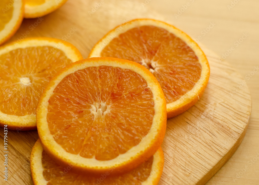 Oranges sliced on the table Oranges sliced on the table
