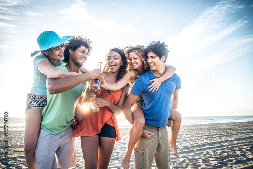 Friends partying on the beach