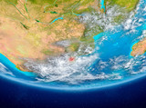 Swaziland on globe from space