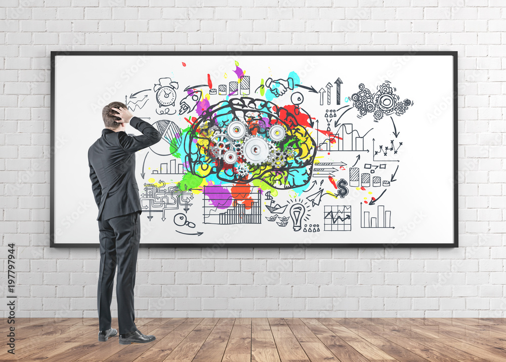 Confused businessman, rear view, brainstorm Confused businessman, rear view, brainstorm