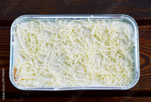 Uncooked Lasagne in aluminum foil box