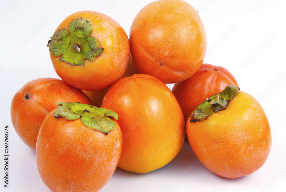 a lot of Diospyros kaki on white background a lot of Diospyros kaki on white background