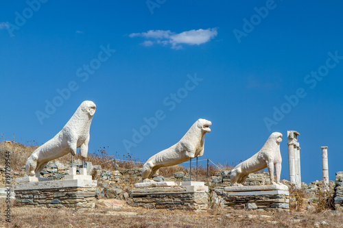 The Stone Lions on the Island of Delos, Greece Honoring Apollo Against Brilliant Blue Clear Sky photo