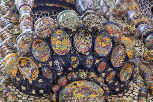 Mexican talavera style pottery used in altar and fountain. This colorful handmade maiolica have a blurred appearance as they fuse slightly into the glaze. Vibrant colors and unique designs in each one