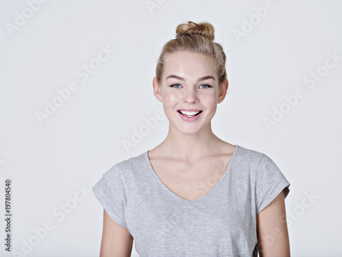 Portrait of young smiling girl.