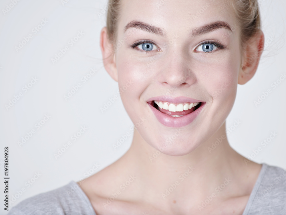 Portrait of a  beautiful young smiling  girl.