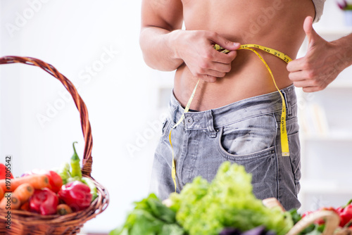 Young man in healthy eating and dieting concept