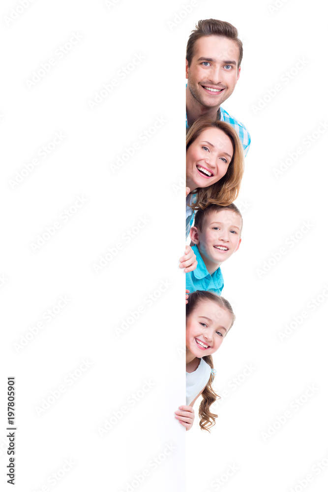 Young family with looking out of the banner Young family with looking out of the banner