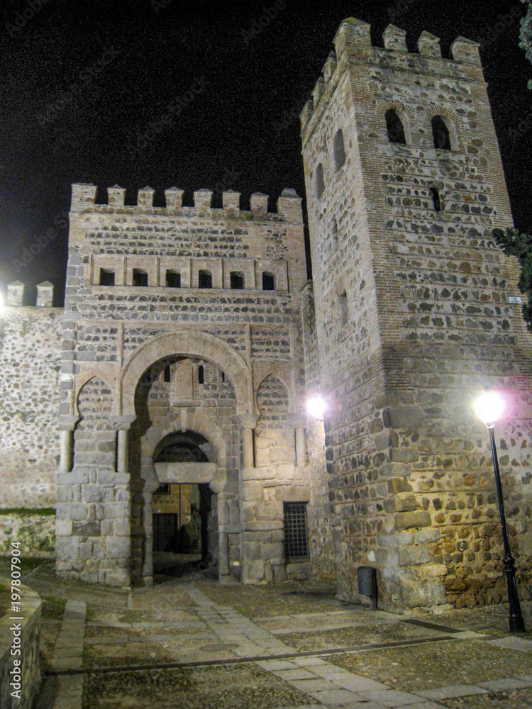door of Alfonso sixth at night in wall of Toledo