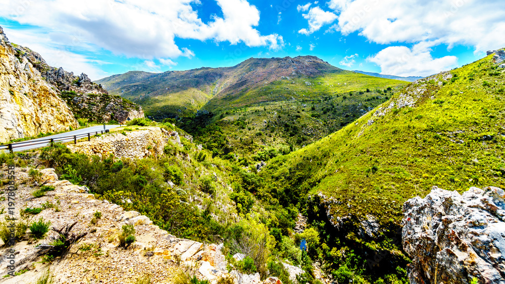 Naklejka premium Spectacular View of Detoitsriver Gorge near the highest point of Franschhoek Pass, or Lambrechts Road, which runs between the towns of Franschhoek and Villiersdorp in the Western Cape of South Africa
