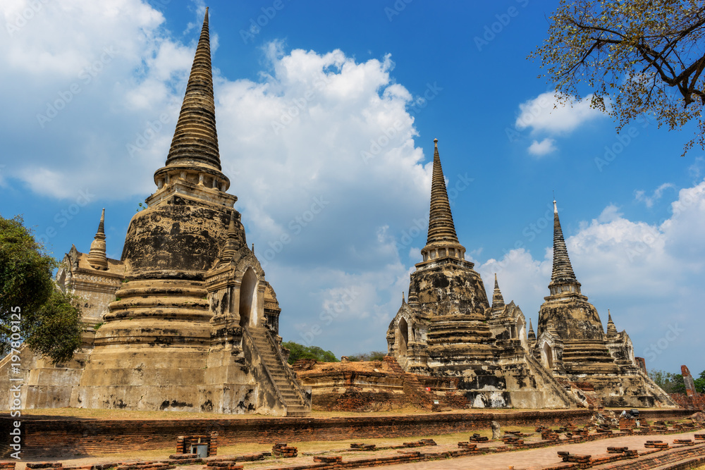 Three old pagoda at Wat Phra Si Sanphet in Ayutthaya historical park at Ayutthaya province near Bangkok Thailand.
