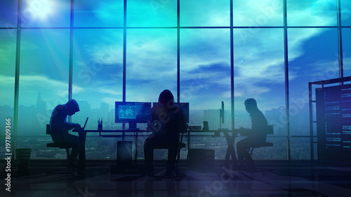Silhouettes of hackers at work