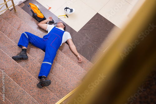Dead contractor worker felling off the stairs