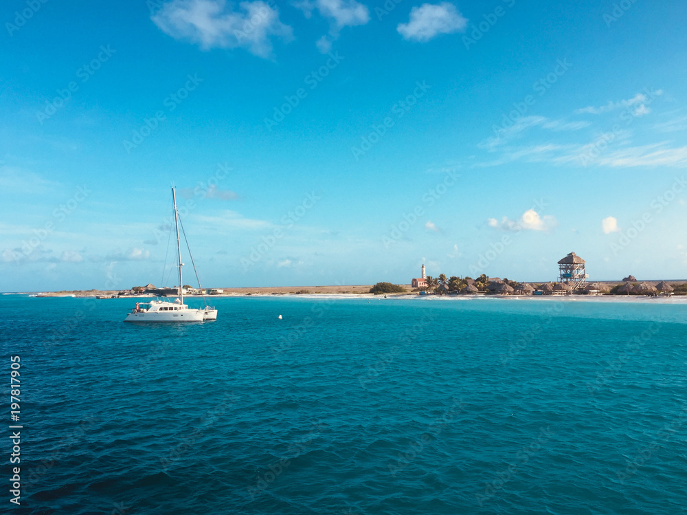 catamaran sailing boat near coast of Klein Curacao island  -