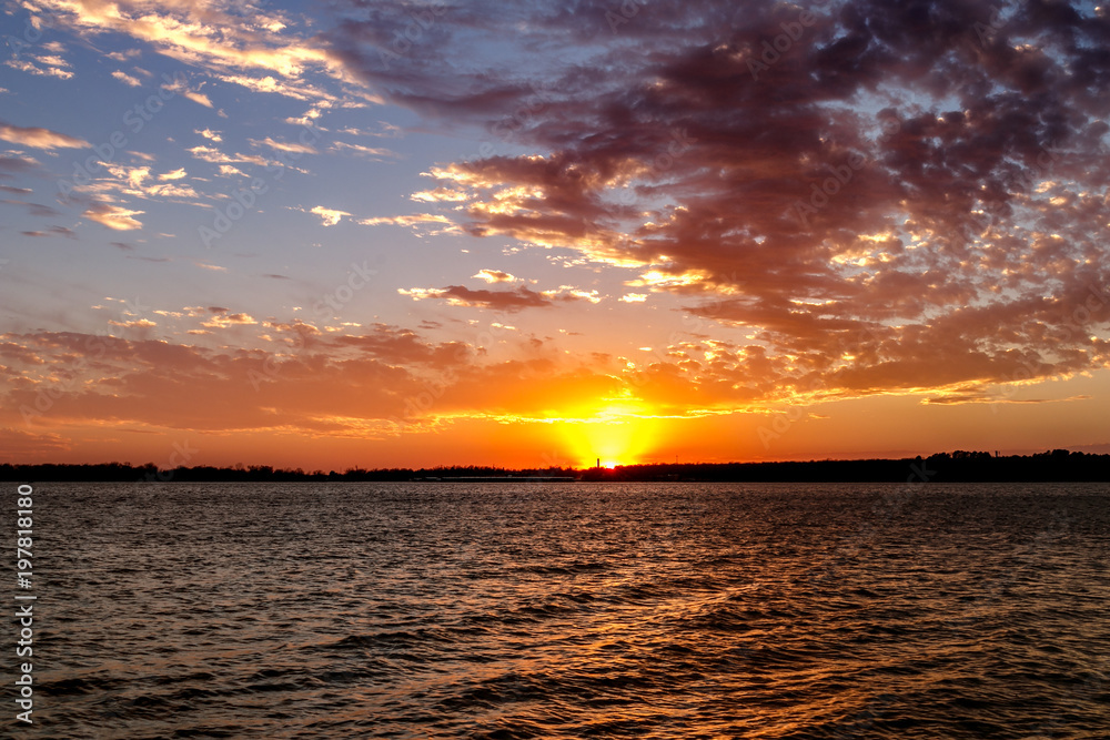 Beautiful bright sunset over a lake in Oklahoma.